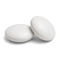 Two white round compounded tablets