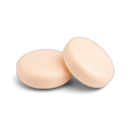 Two pale peach round chewable tablets