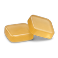 Two translucent amber gel troches